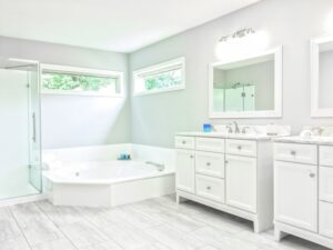 Bathroom after Houston bathroom remodeling with a partially sunken bathtub