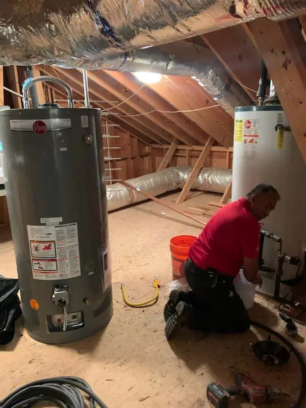 Santhoff plumber performing Houston water heater installation