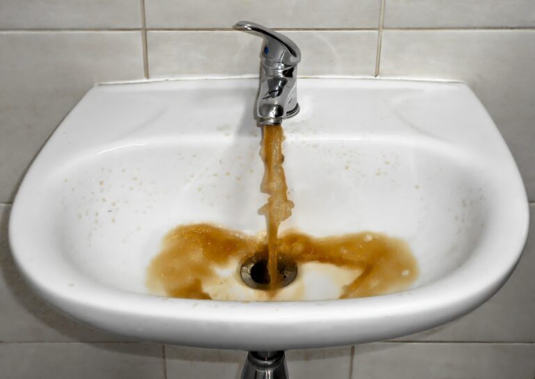 dirty water flowing from sink needs 24 hr. plumber in Houston
