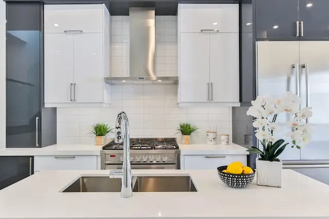 Island with sink after Houston kitchen remodeling.
