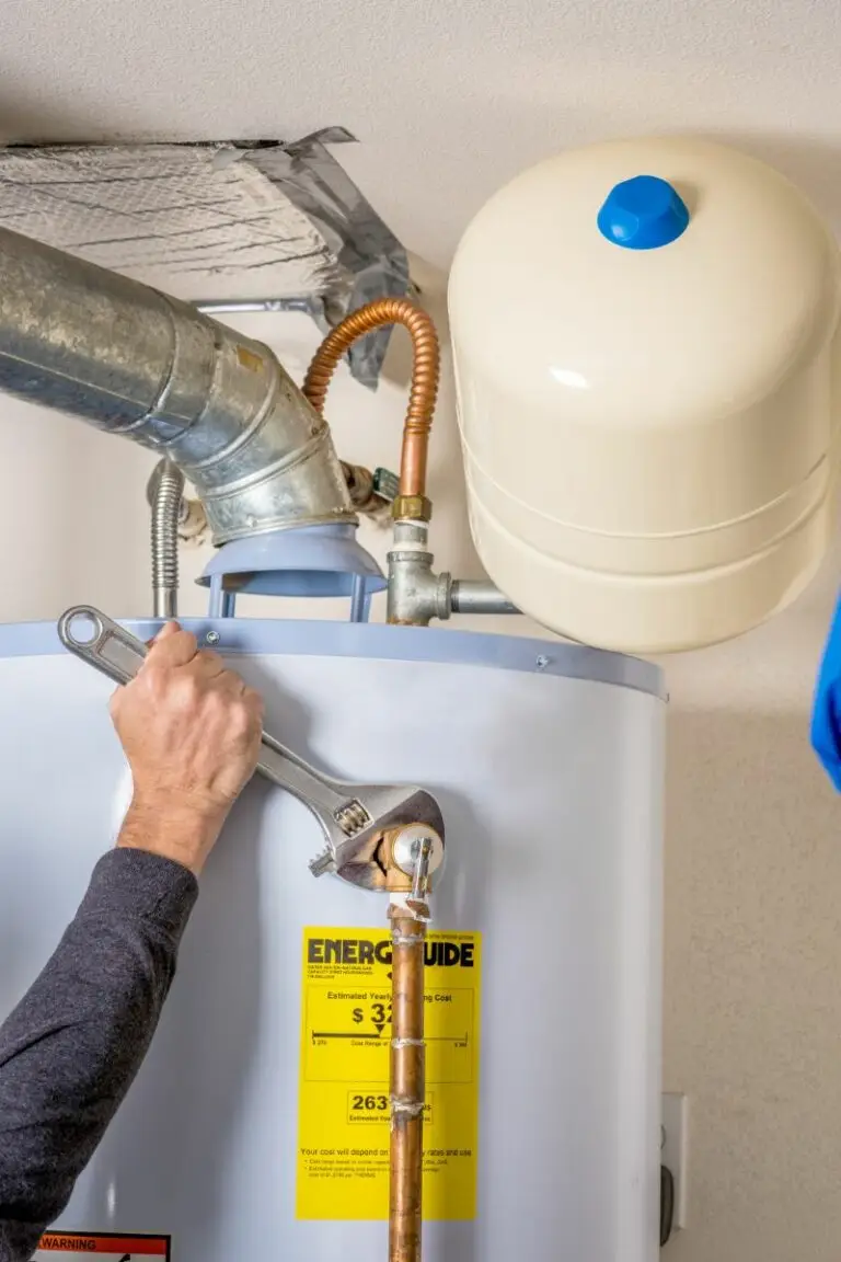 Plumber finishing Houston water heater installation