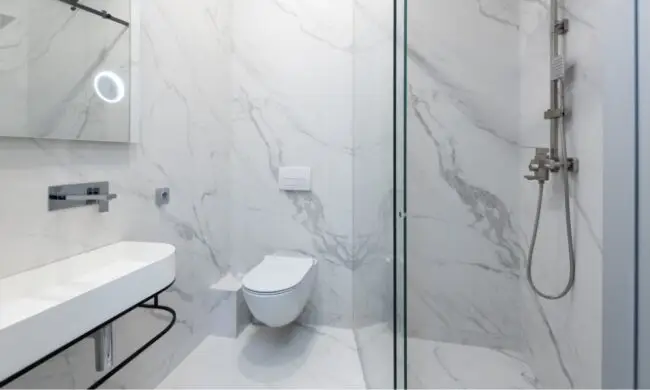 upgraded bathroom with modern toilet after Houston toilet repair